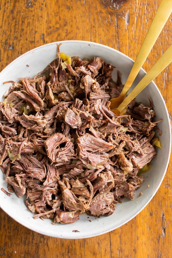 Shredded italian beef in a bowl. 