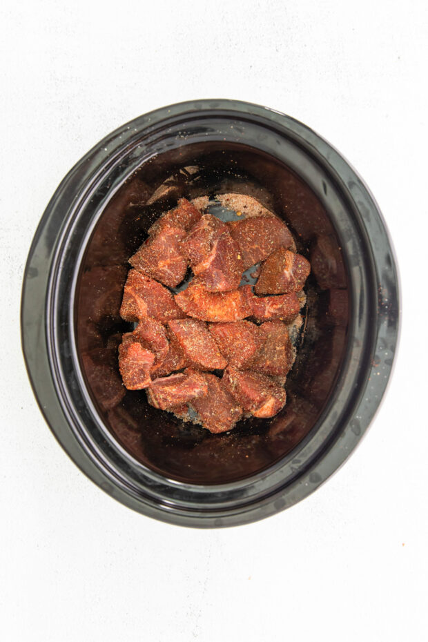 Slow Cooker Beef Barbacoa uncooked in a slow cooker. 