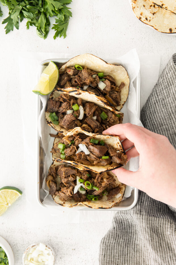 Slow Cooker Beef Barbacoa on a tray. 