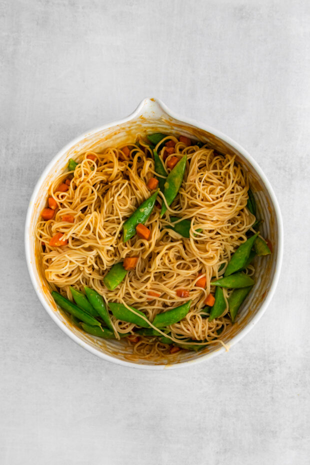 Spicy Peanut Noodles wiht snap peas and carrots.