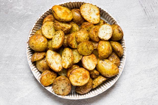 Air Fryer Roasted Potatoes on a white plate.