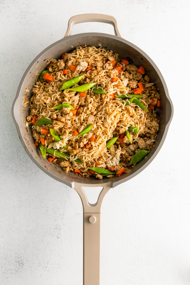 Ground Chicken Ramen Stir Fry in a skillet. 