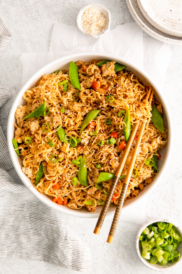 Ground Chicken Ramen Stir Fry in a bowl with chopsticks. 