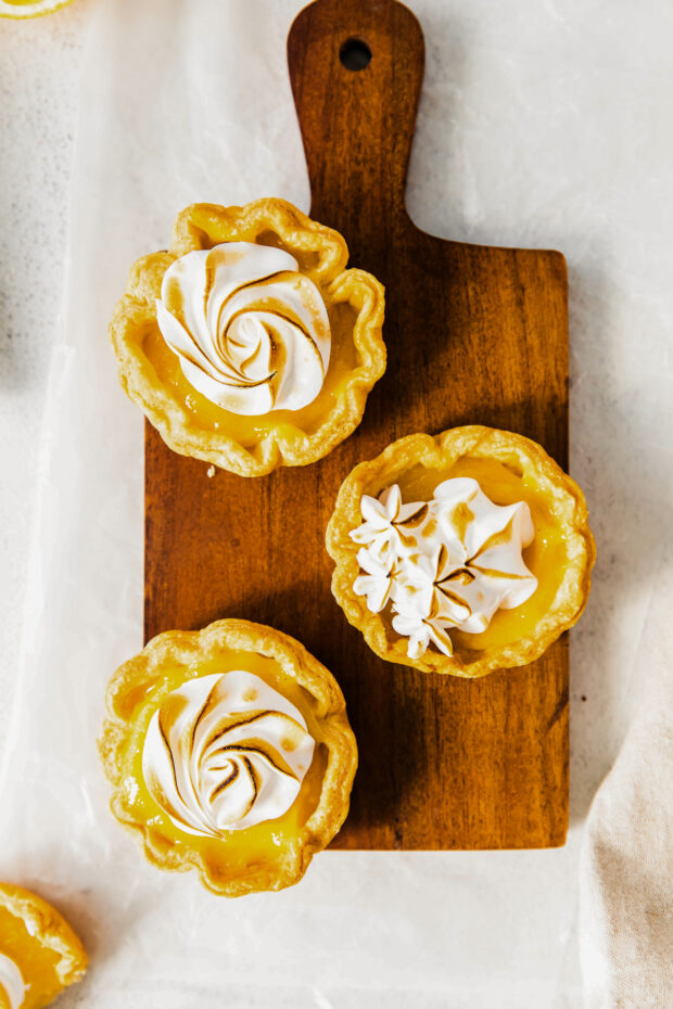 Toasted meringue on top of Mini Lemon Meringue Tarts. 