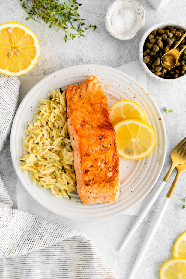 Pan Seared Salmon on a plate with orzo.