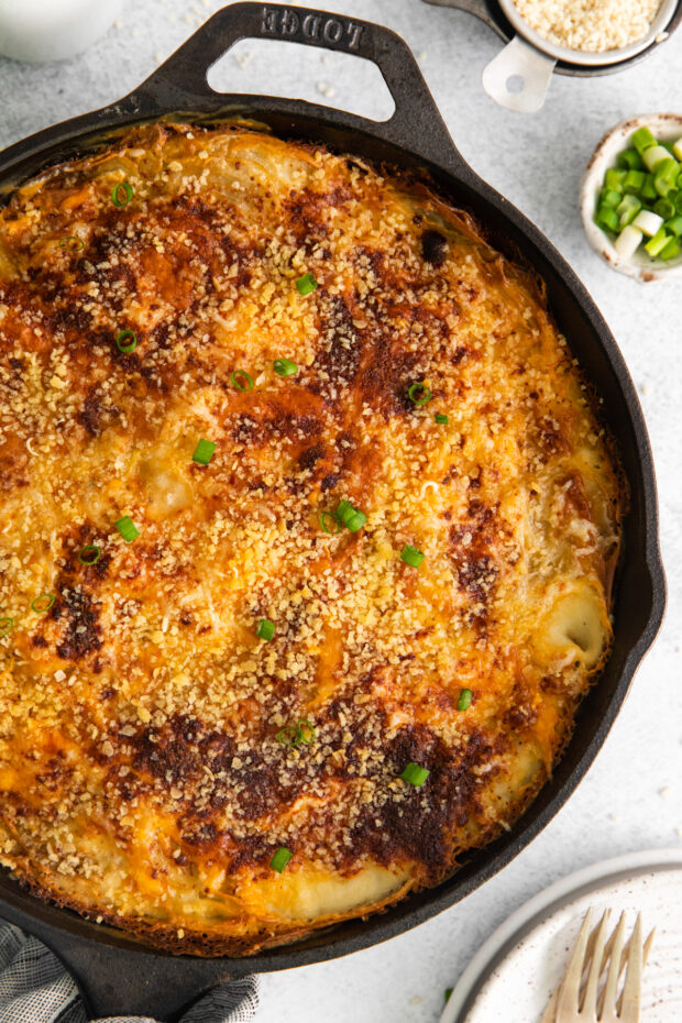 Homemade Scalloped Potatoes sprinkled with green onions.