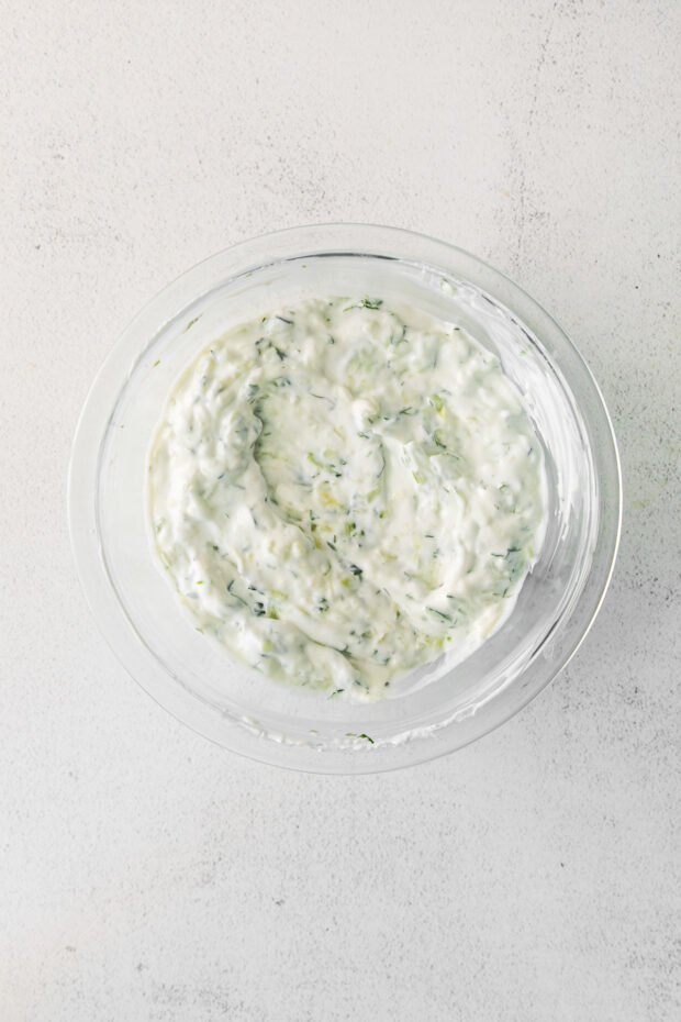 Tzatziki Sauce in a mixing bowl.