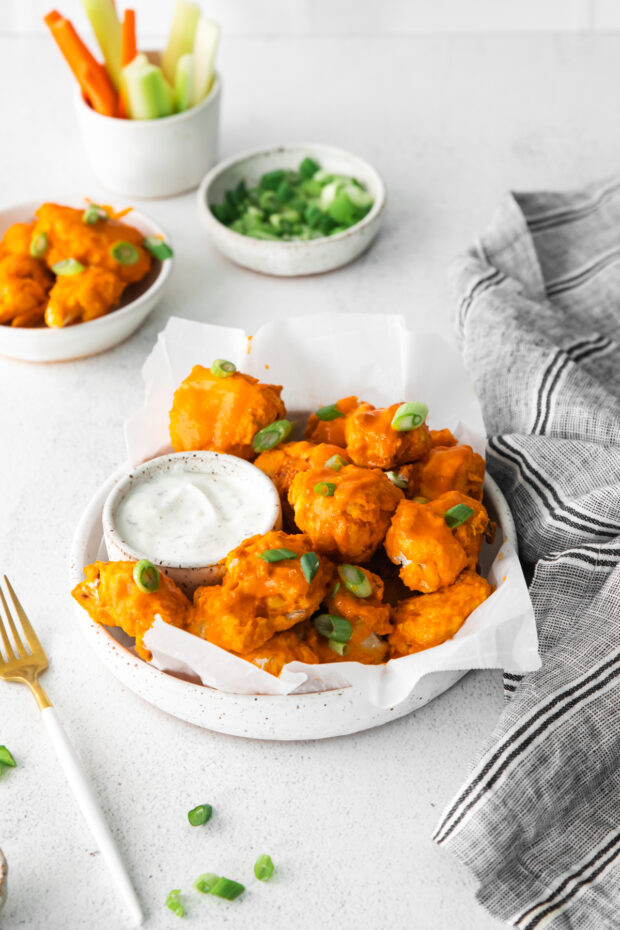 Air Fryer Buffalo Chicken Nuggets served with ranch dipping sauce. 