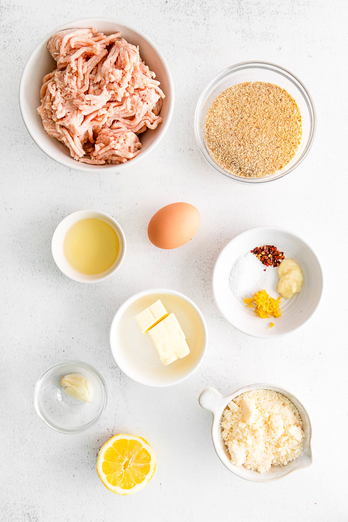 Ingredient to make chicken meatballs on a table. 