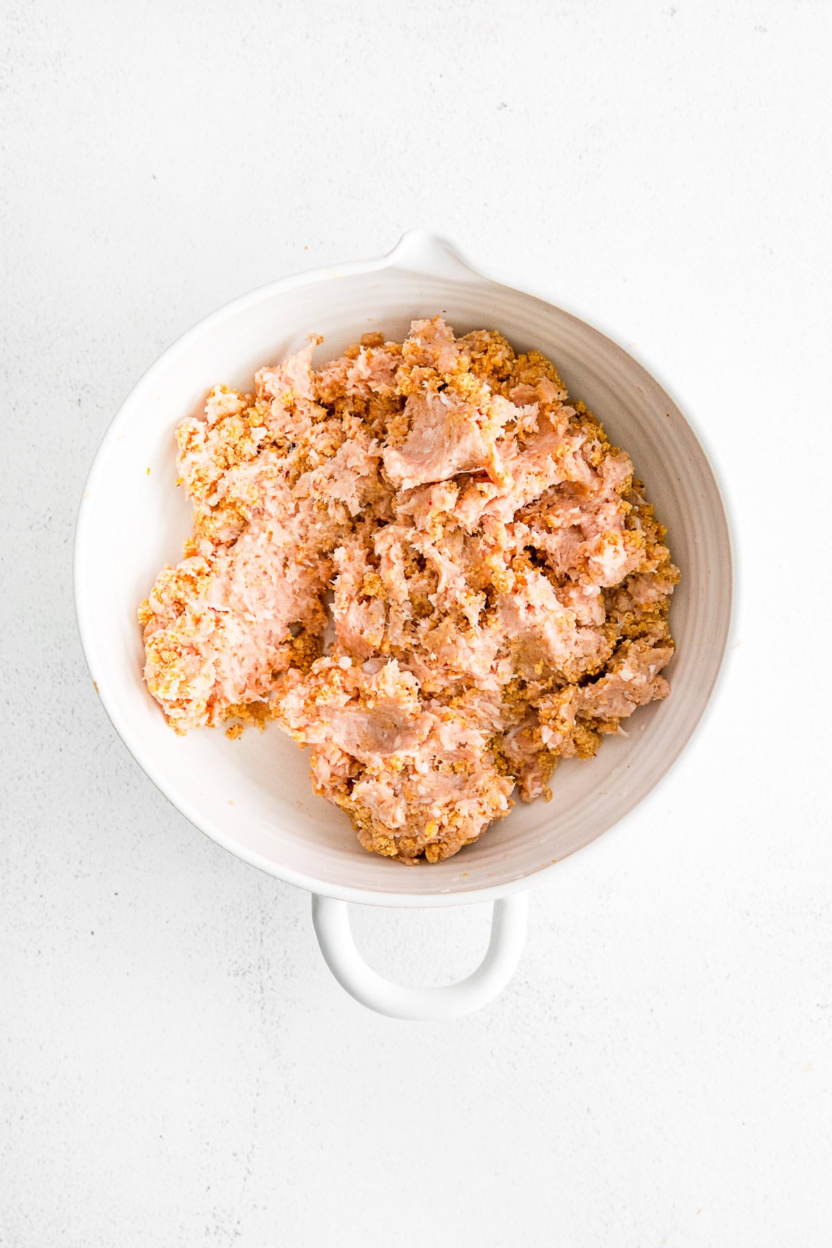 Meatball mixture in a bowl. 
