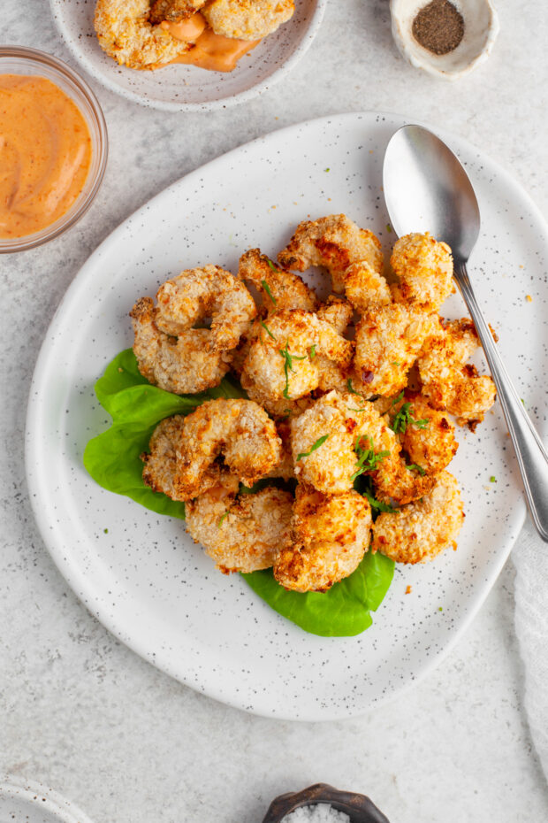 Crispy Air Fryer Shrimp on a white plate.