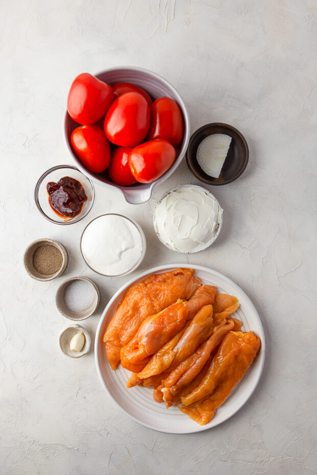 Ingredients to make Creamy Chipotle Chicken on a table. 