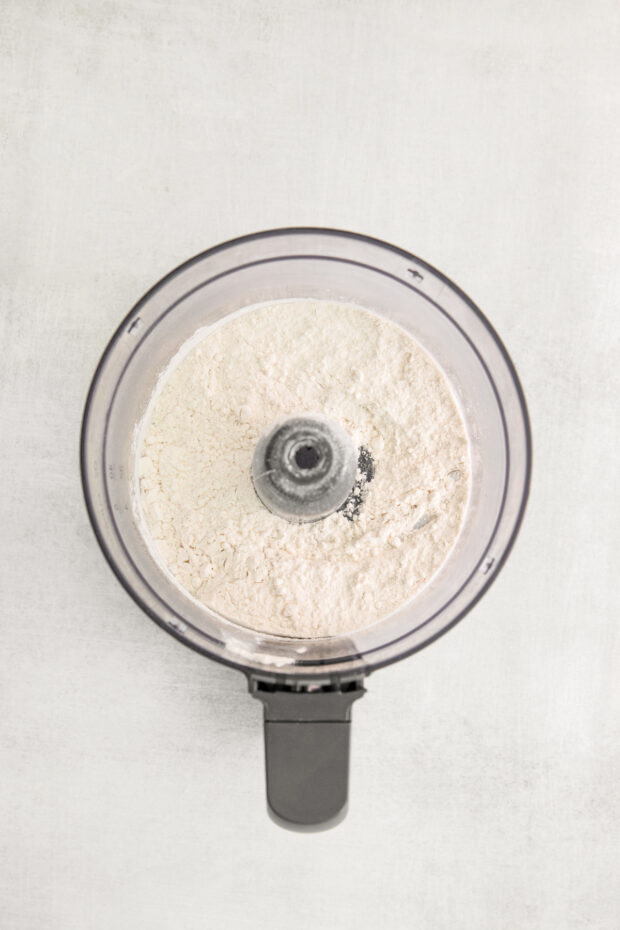 flour and salt in a food processor bowl.
