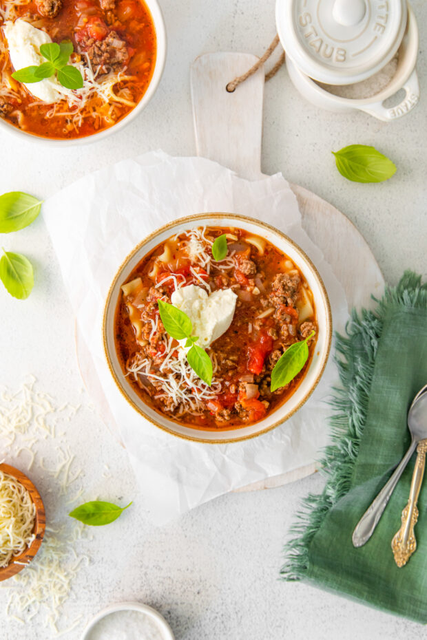 Instant Pot Lasagna Soup garnished with fresh basil.