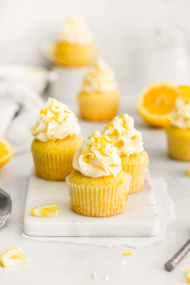 Lemon Curd Cupcakes served with sprinkles. 