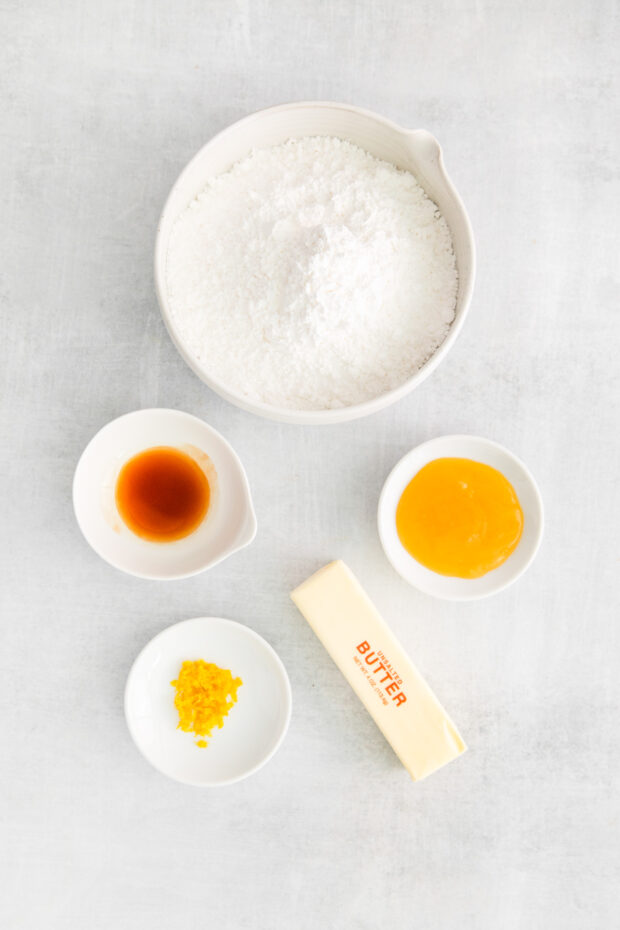 Lemon curd buttercream frosting ingredients on a table. 