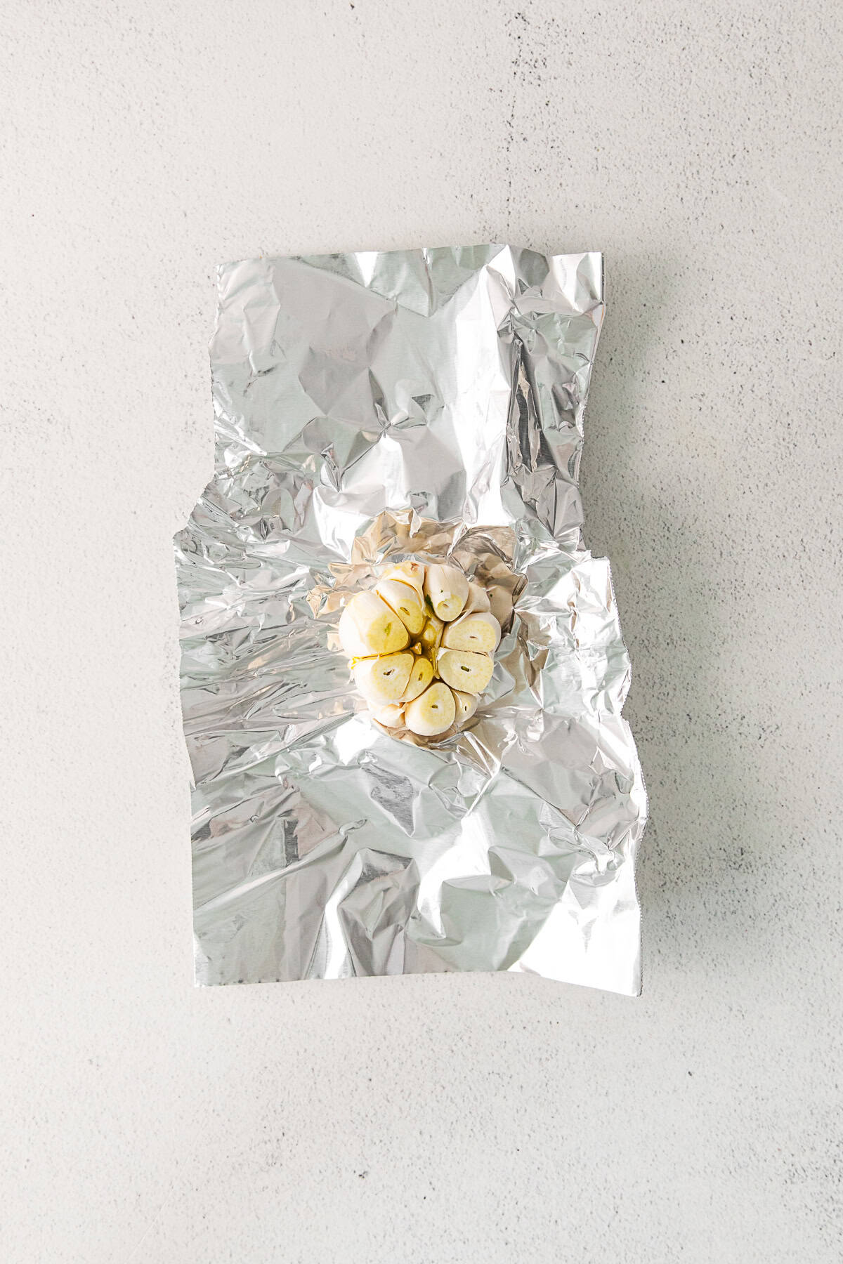 Unroasted garlic in foil.
