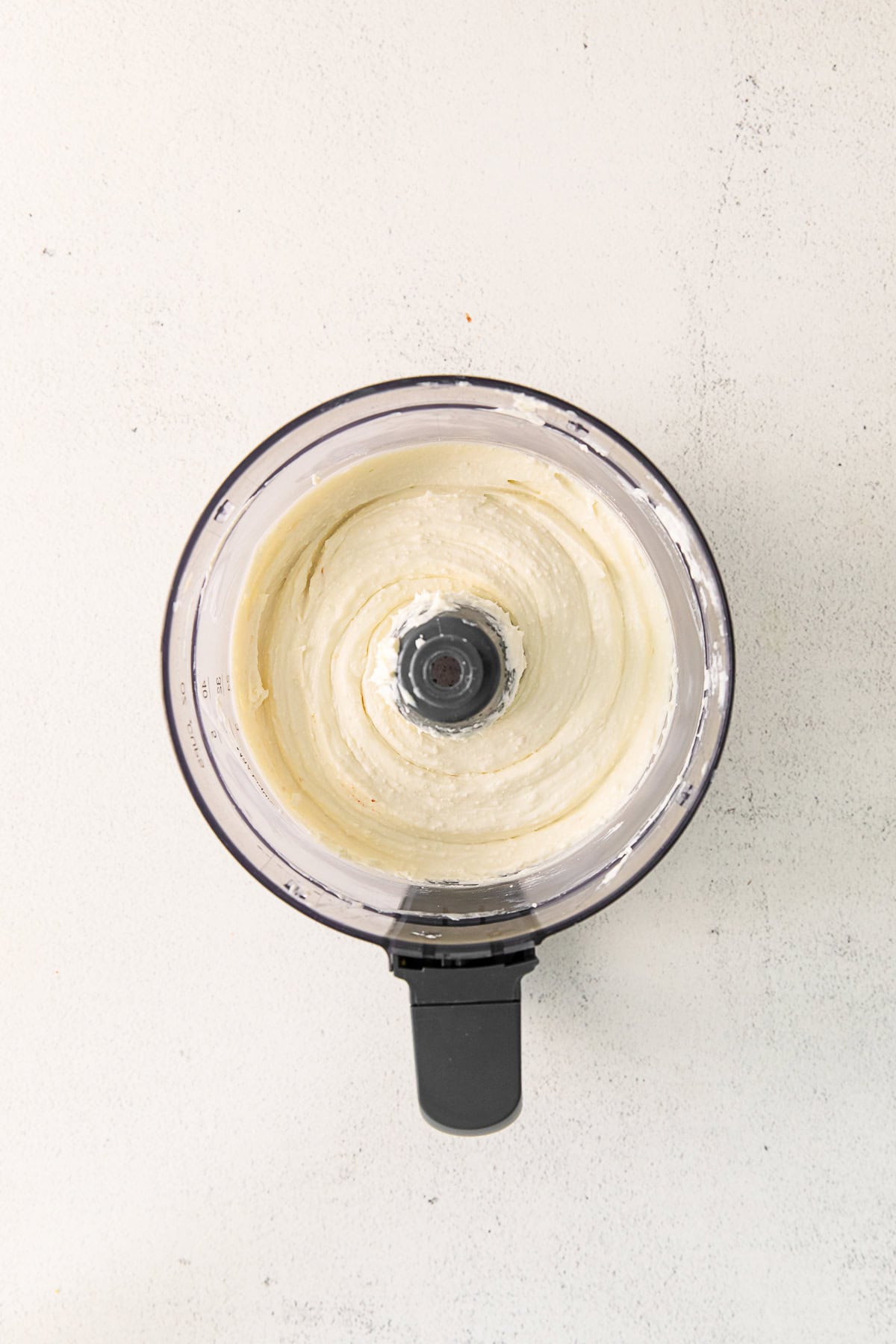 Whipped feta in a food processor.