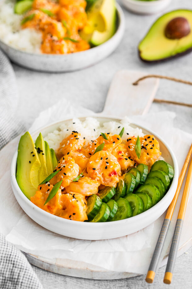 Bang Bang Shrimp Bowls served with chop sticks.
