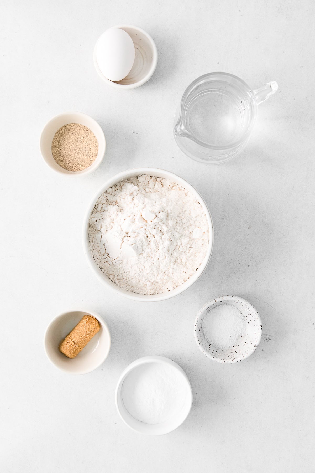 Ingredients to make soft pretzels on a table.