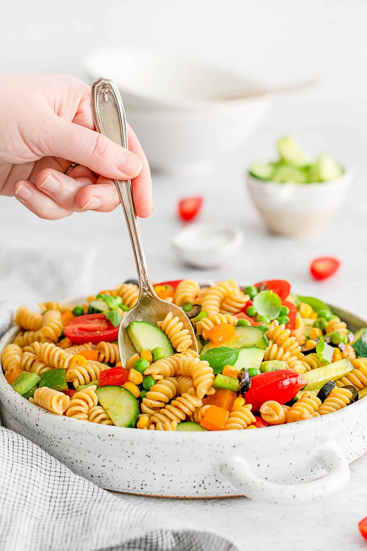 Spooning out some Summer Pasta Salad. 