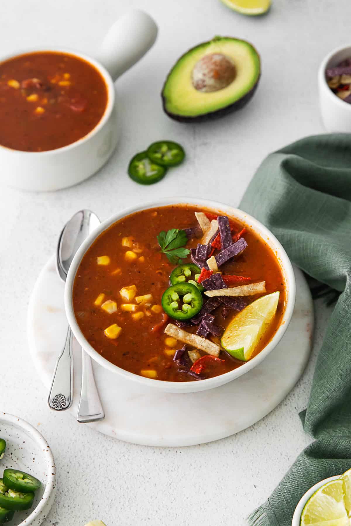 Vegan Tortilla Soup topped with tortilla strips. 
