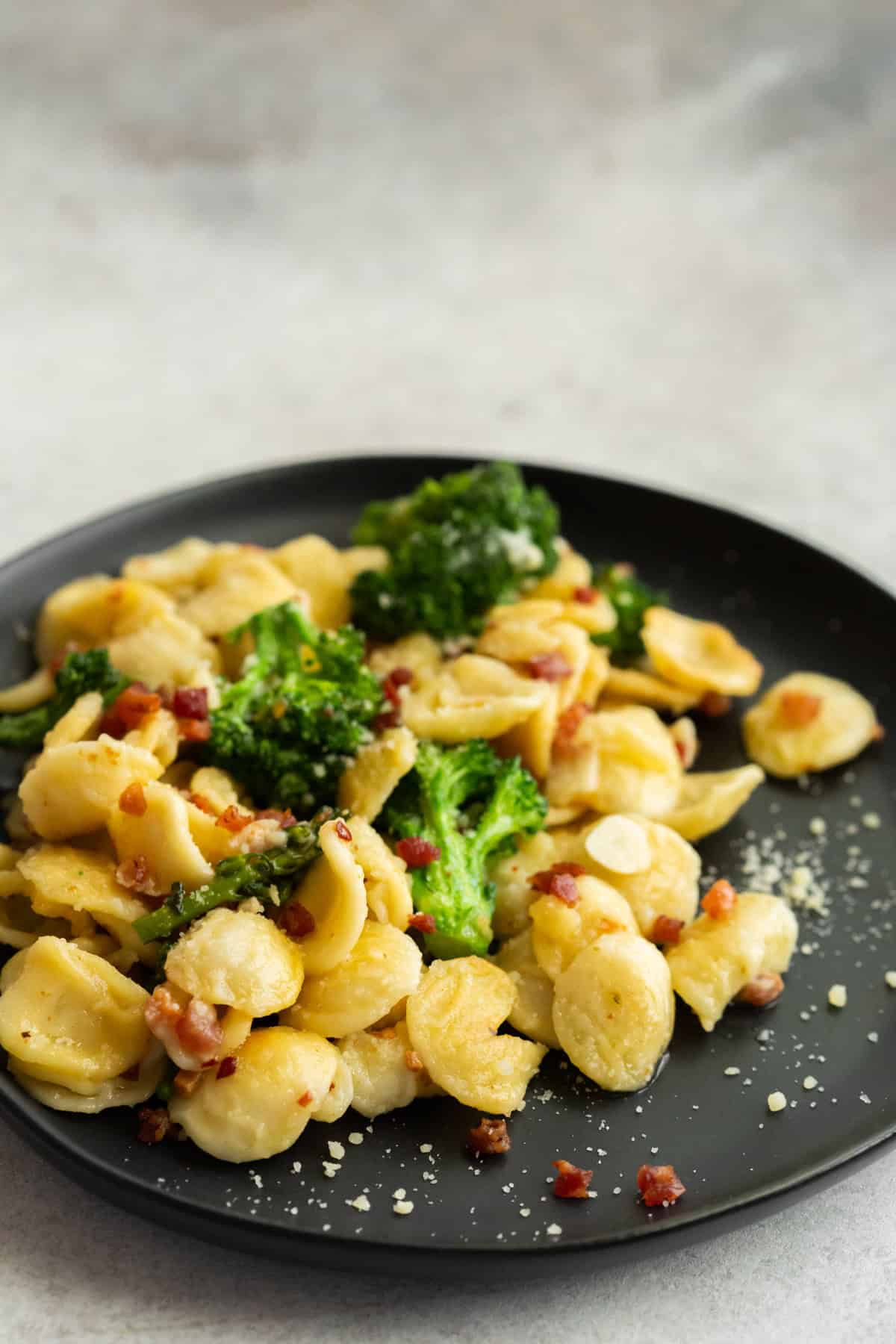 Broccoli Rabe Pancetta Pasta served with extra pancetta.