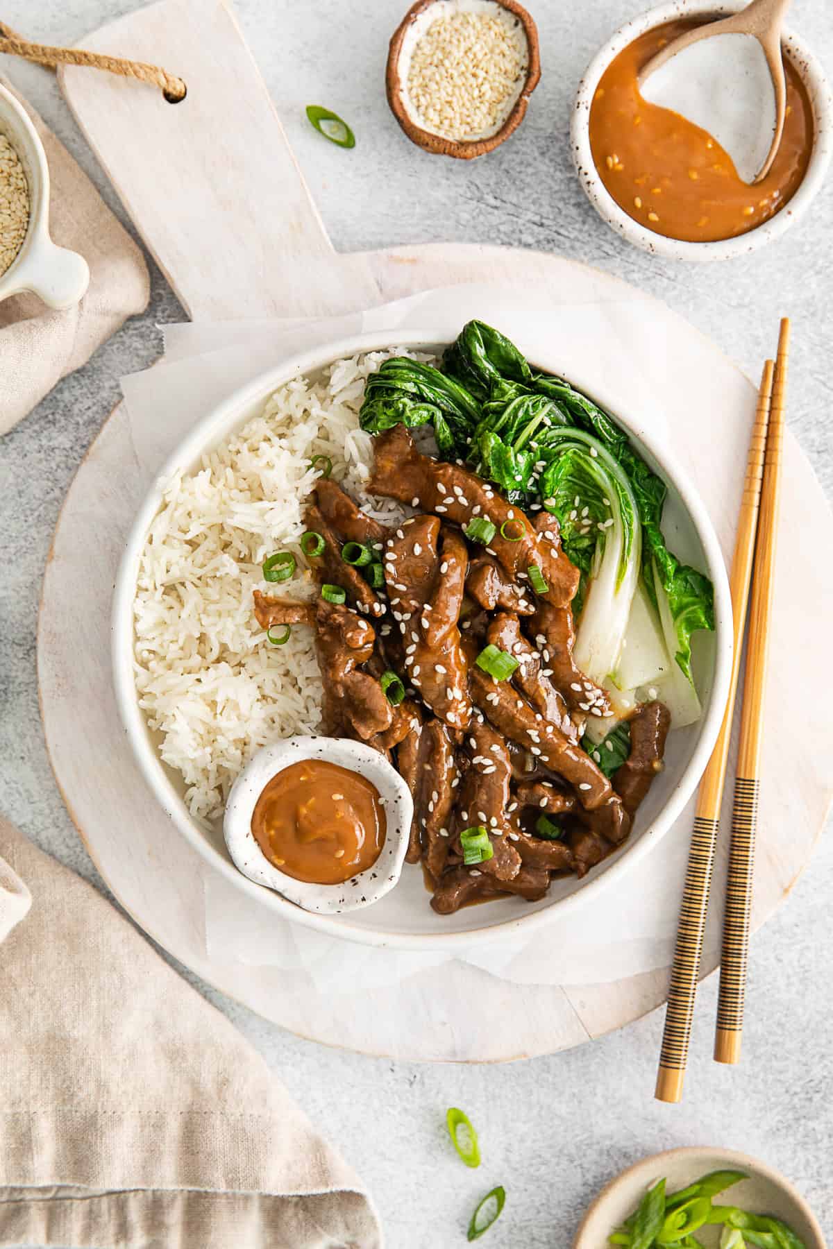 Beef Bulgogi Rice Bowls topped with sesame seeds. 
