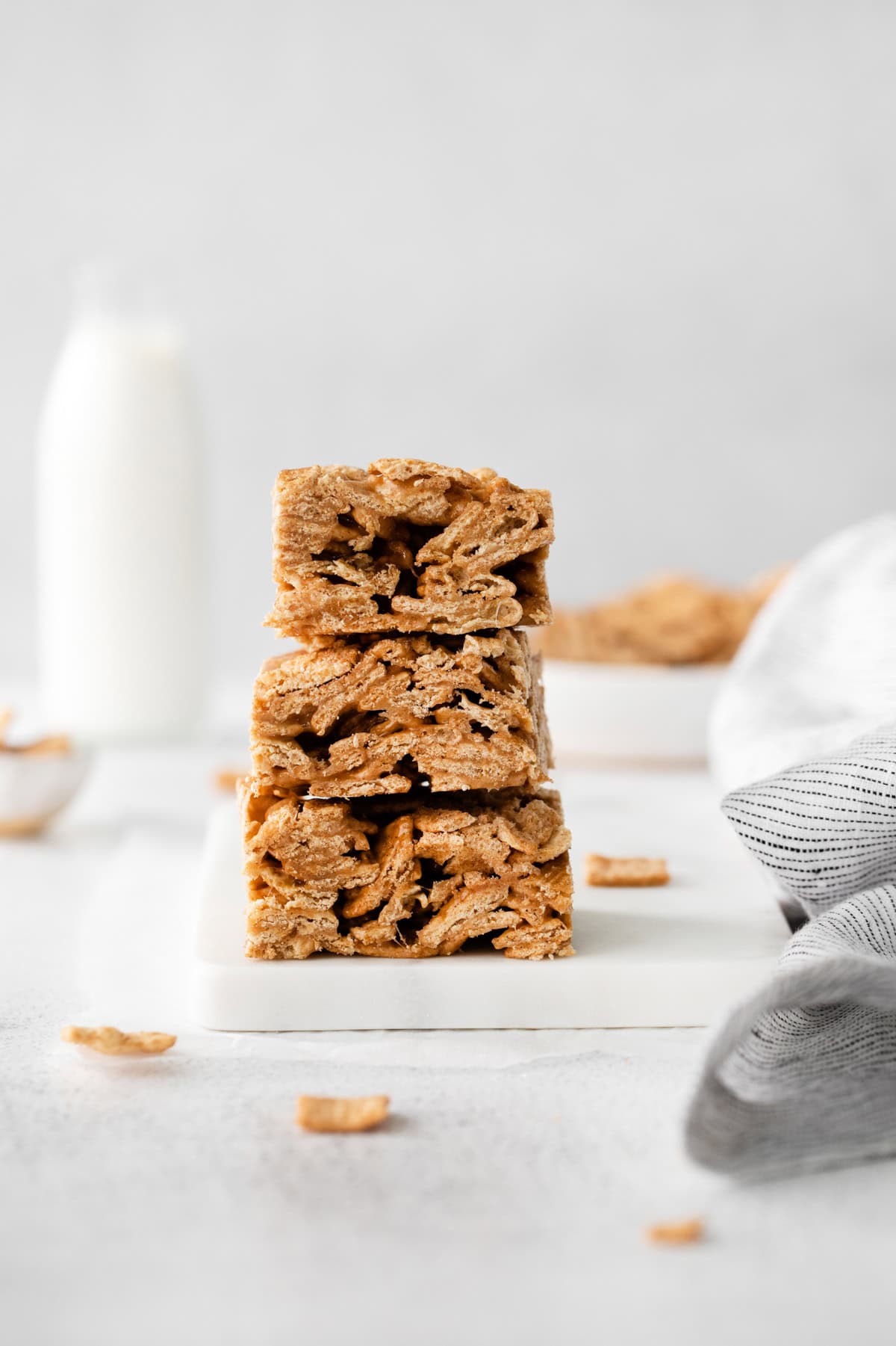 Cinnamon Toast Crunch Cereal Bars stacked on top of each other. 