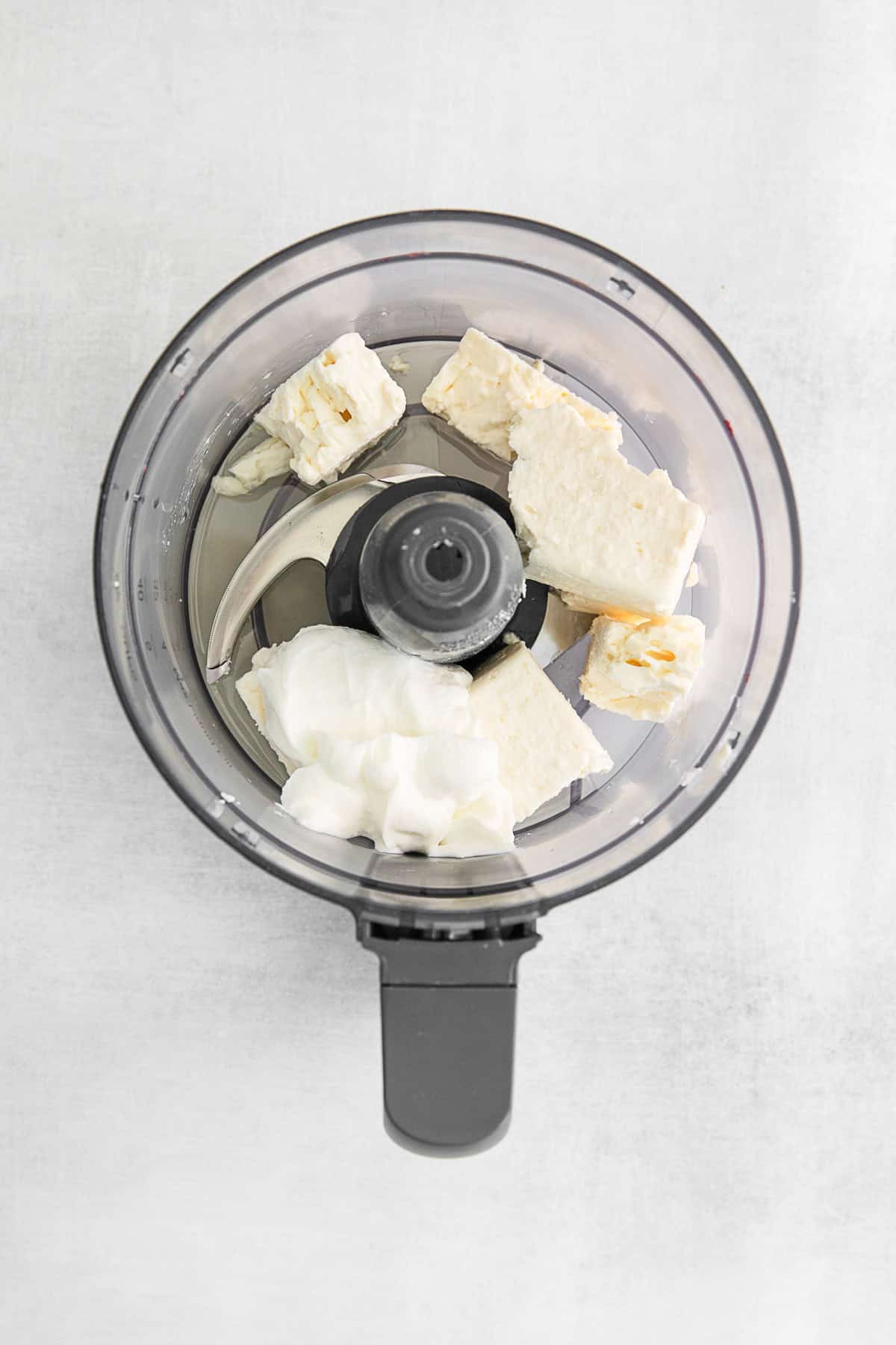 Feta cheese in a food processor. 