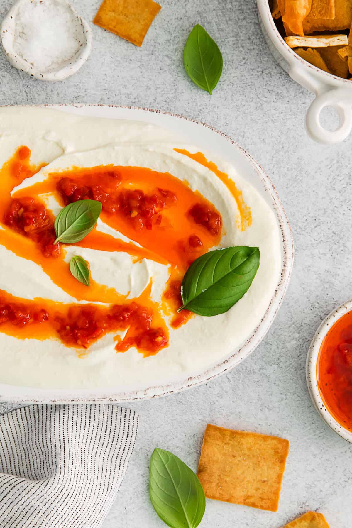 Harissa Whipped Feta topped with extra harissa and basil. 