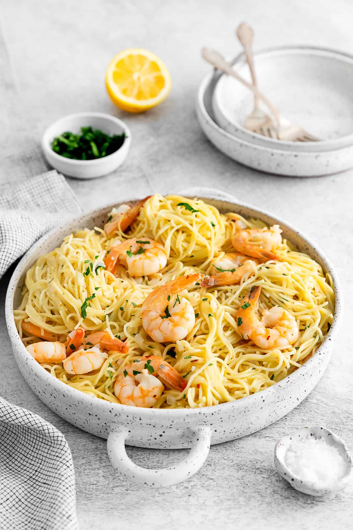 Instant Pot Shrimp Scampi in a round bowl with parsley on top. 