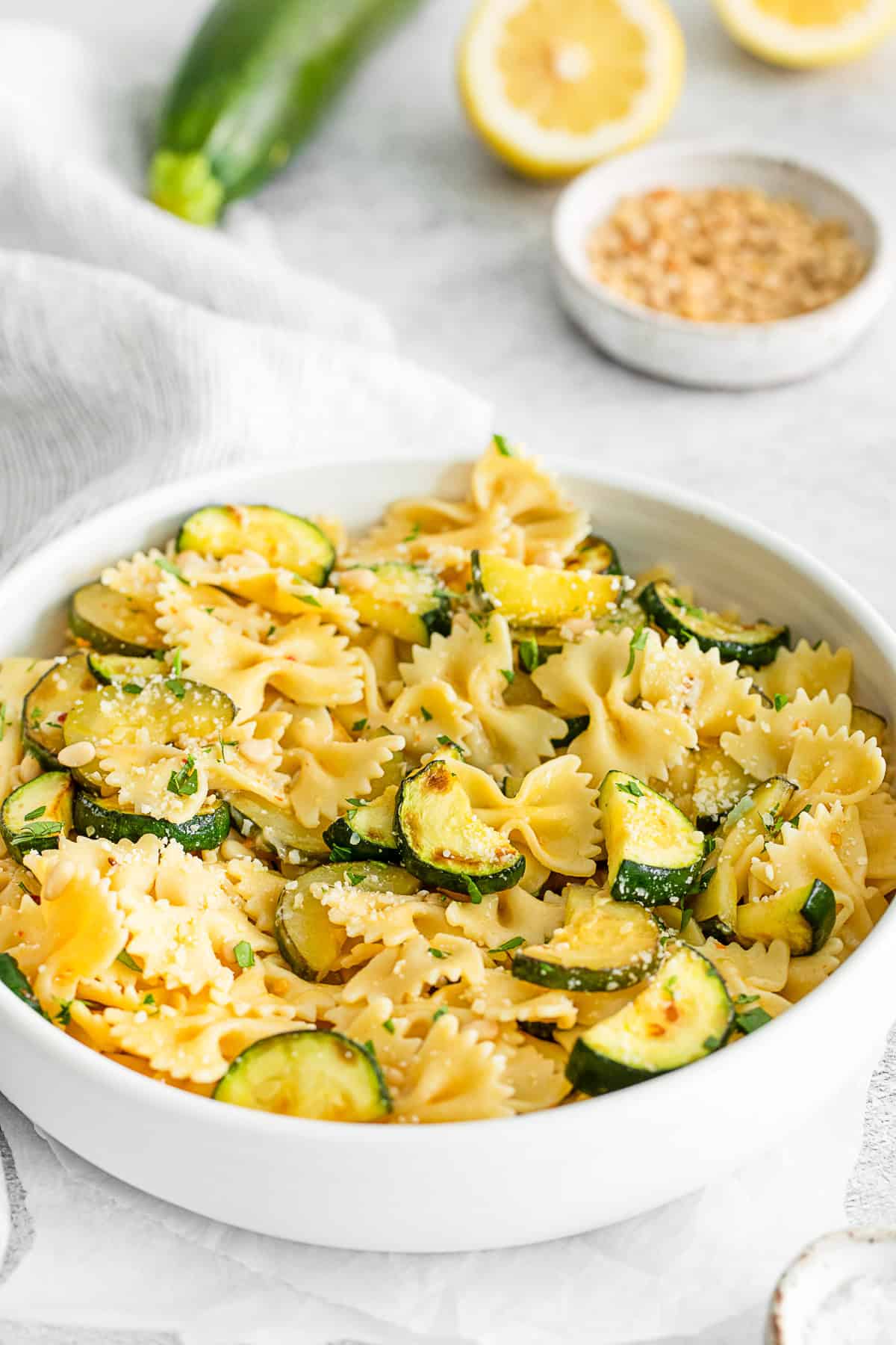Lemon Zucchini Pasta topped with parmesan cheese.