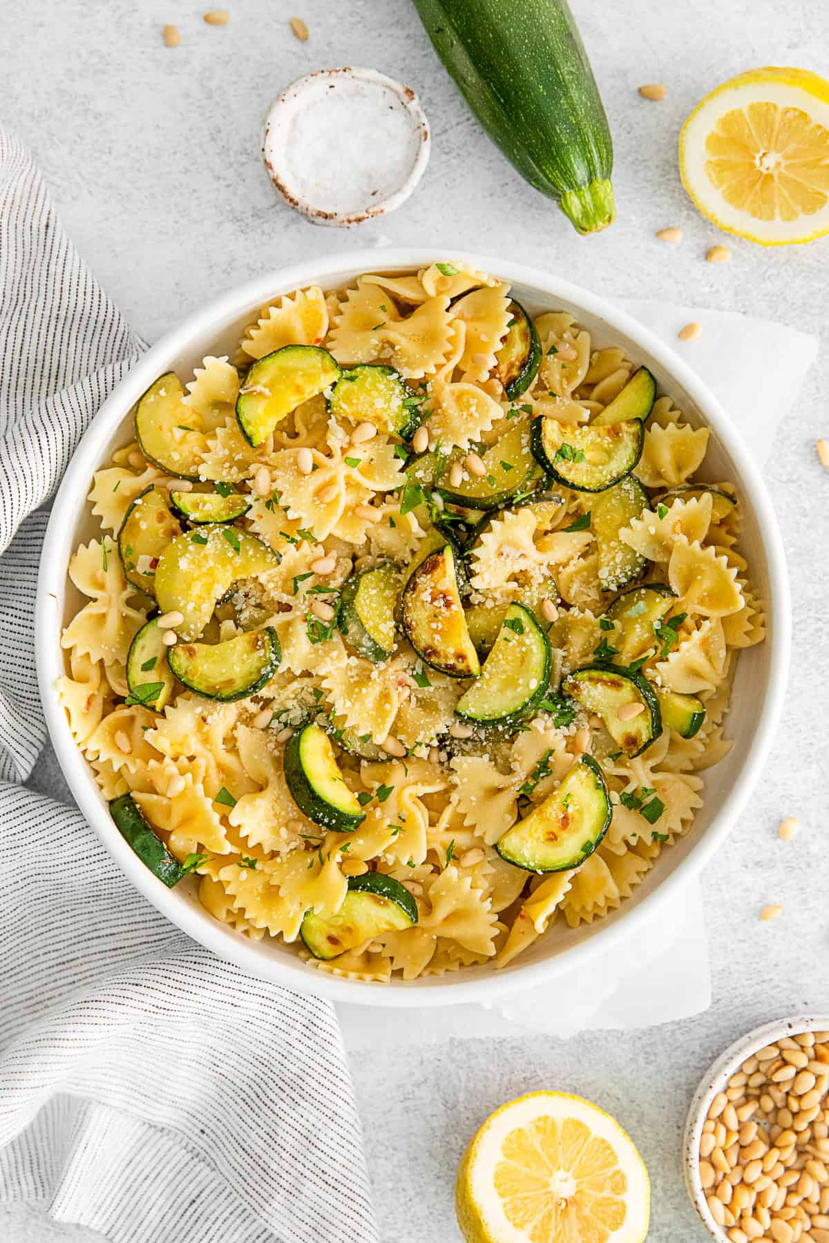 Lemon Zucchini Pasta sprinkled with parmesan cheese.