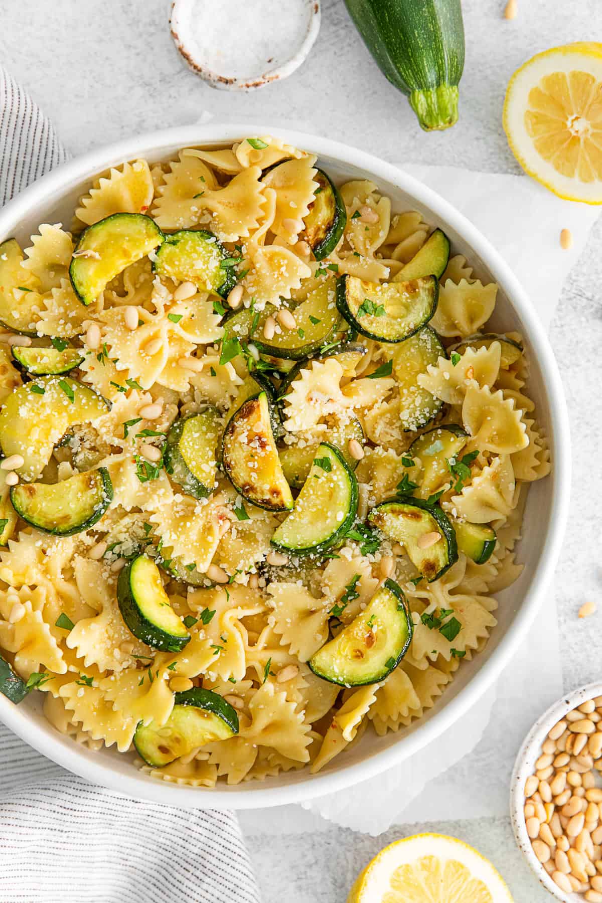 Lemon Zucchini Pasta garnished with pine nuts.