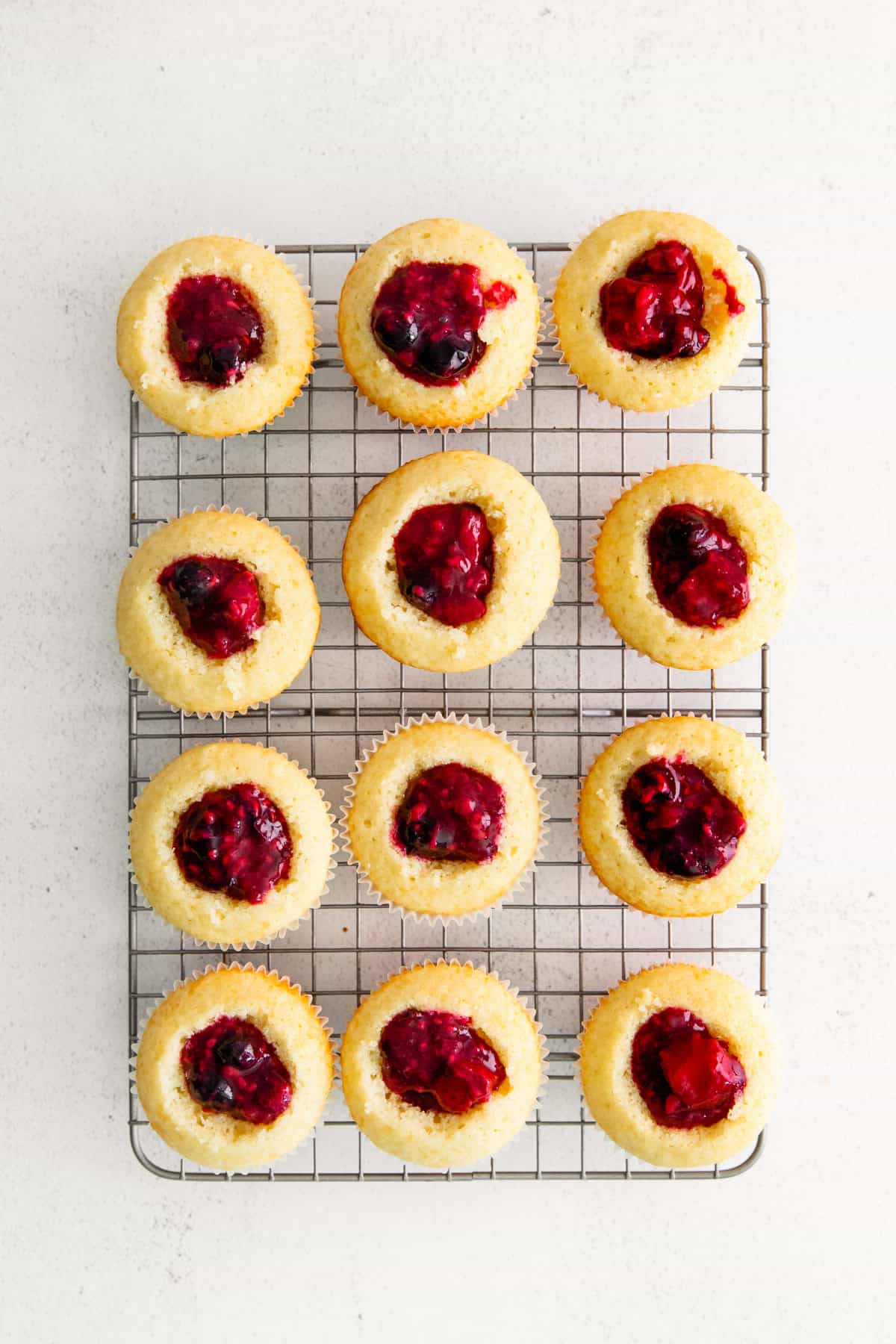 Vanilla cupcakes stuffed with a fresh berry sauce. 