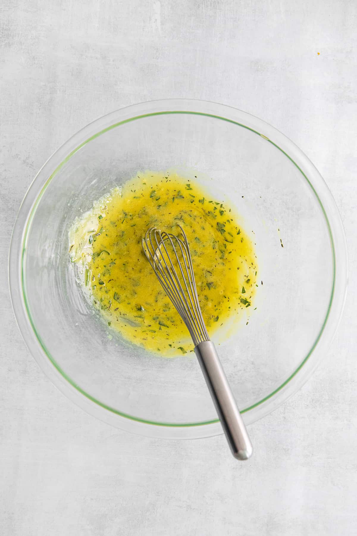 Vinaigrette whisked in a bowl.