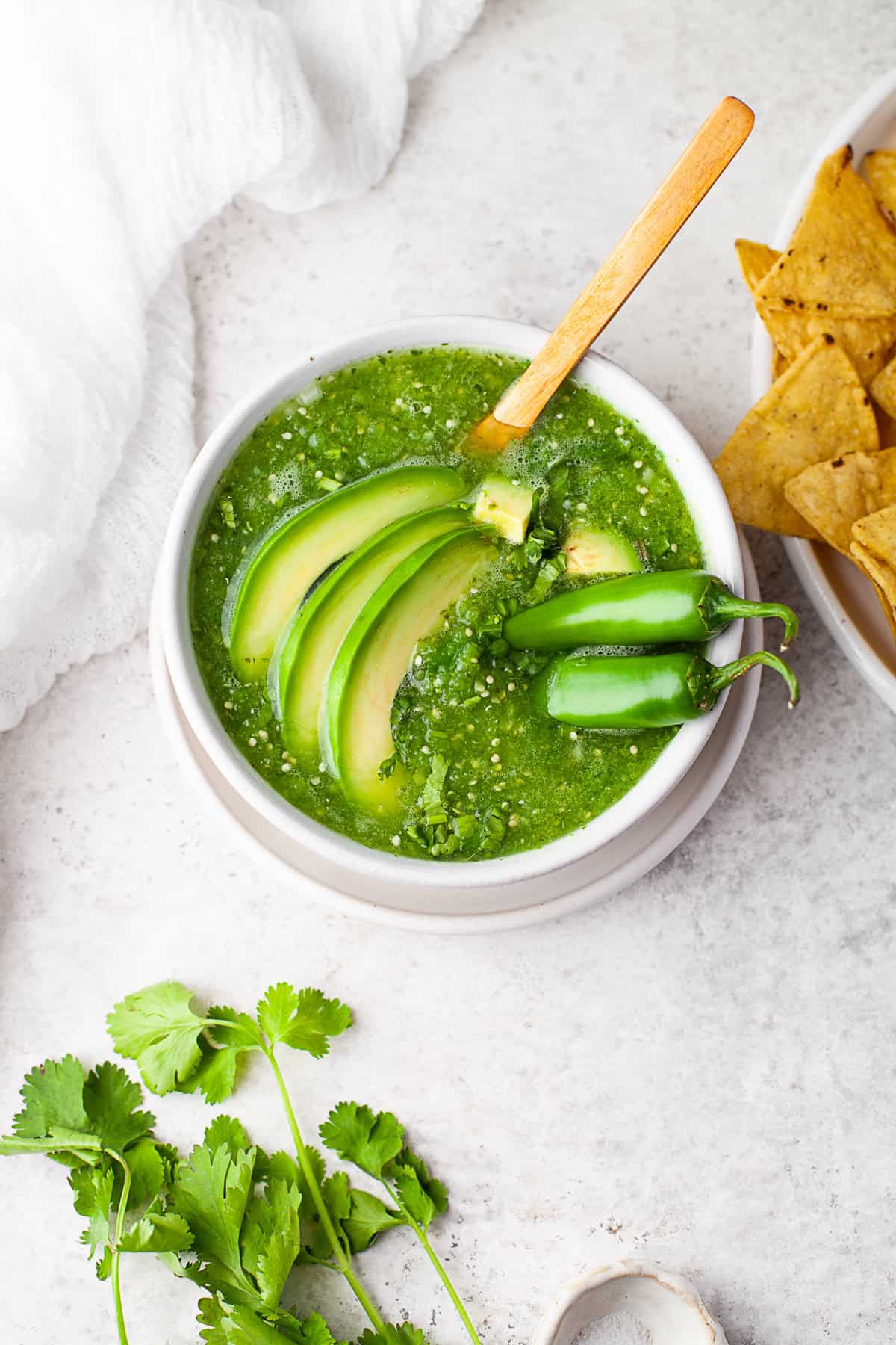 Homemade Salsa Verde in a white bowl. 