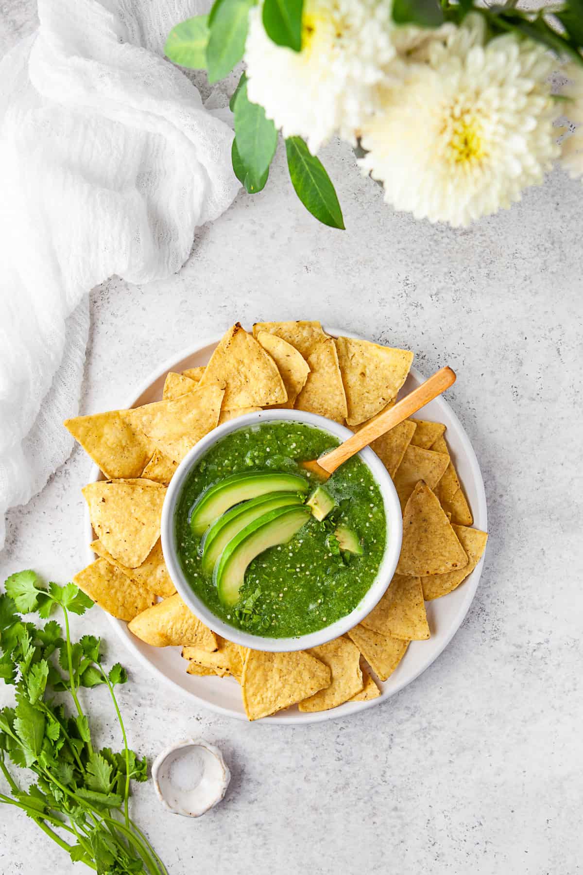 Homemade Salsa Verde served with avocado on top. 
