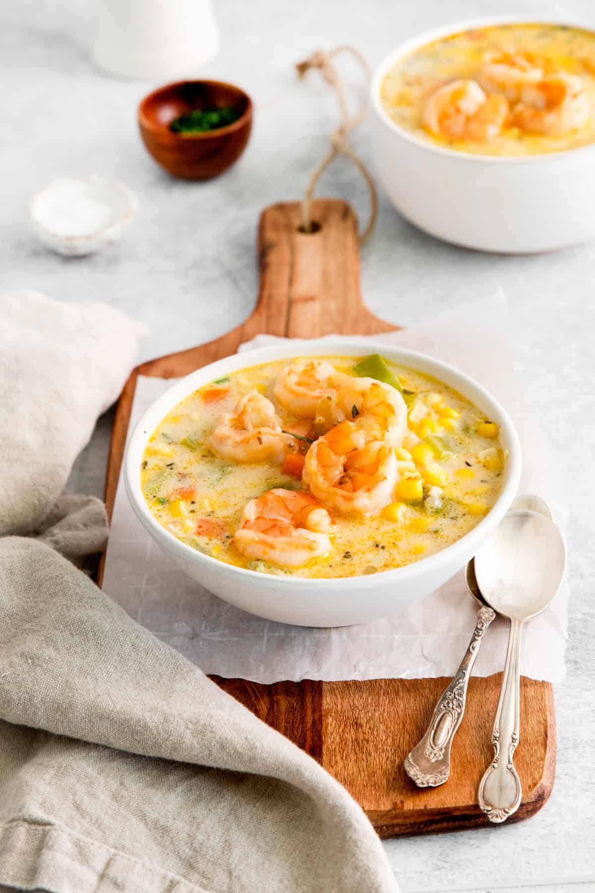 Shrimp Corn Chowder in a white bowl. 