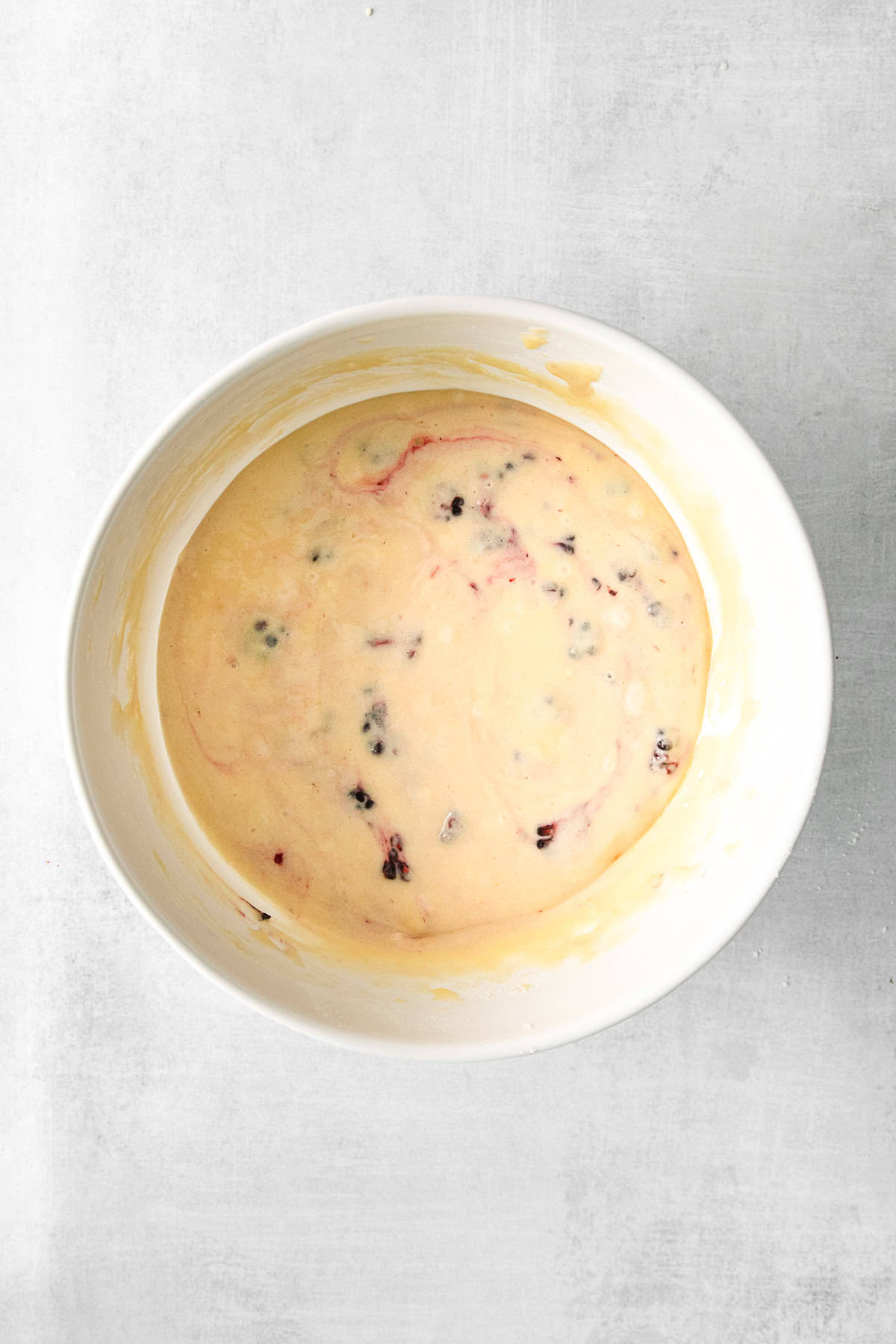 Blackberries folded into vanilla cake batter.