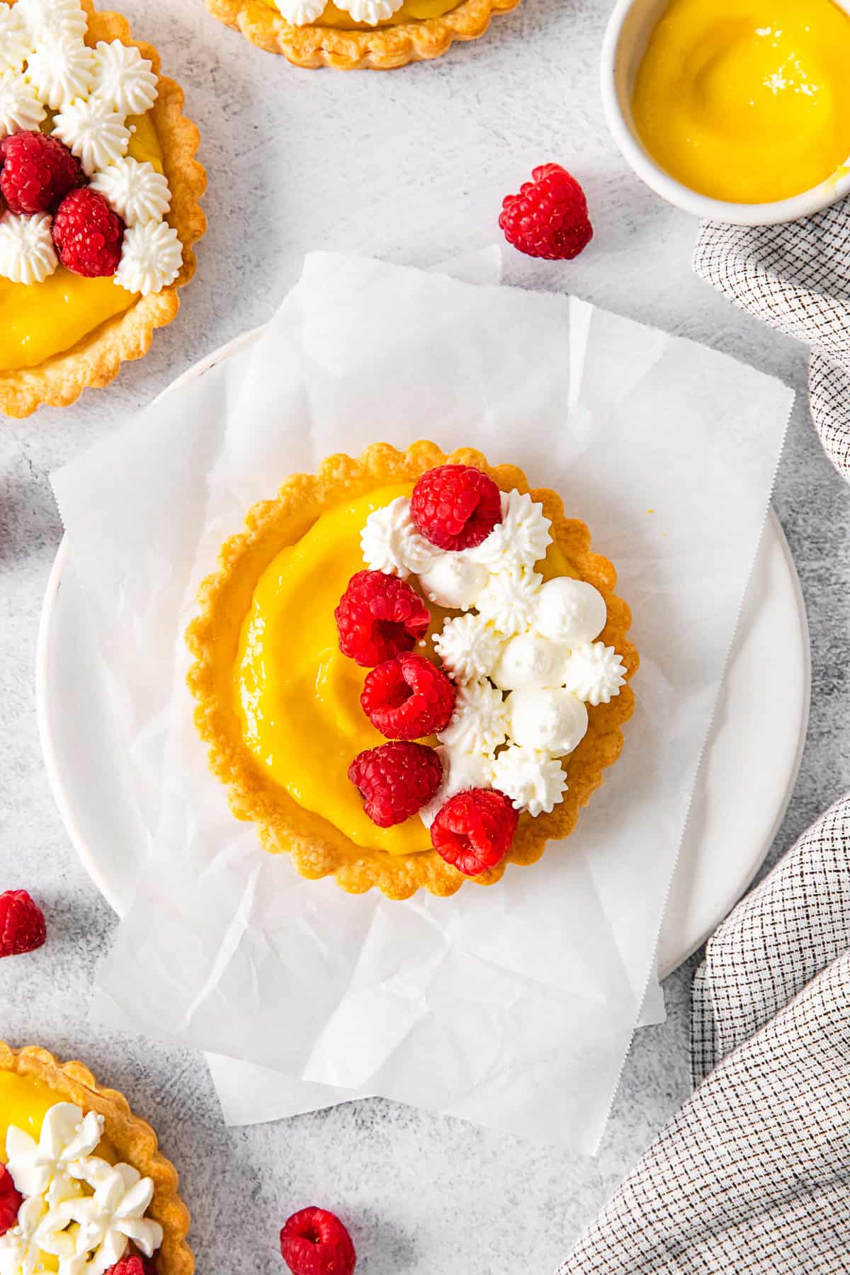 Lemon Curd Tarts on a plate. 