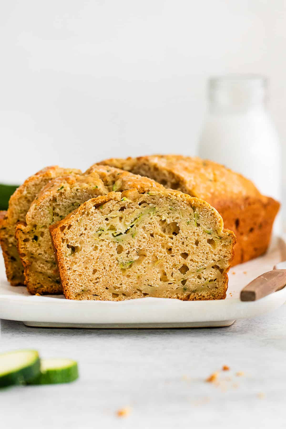 A slice of Zucchini Bread on a plate.