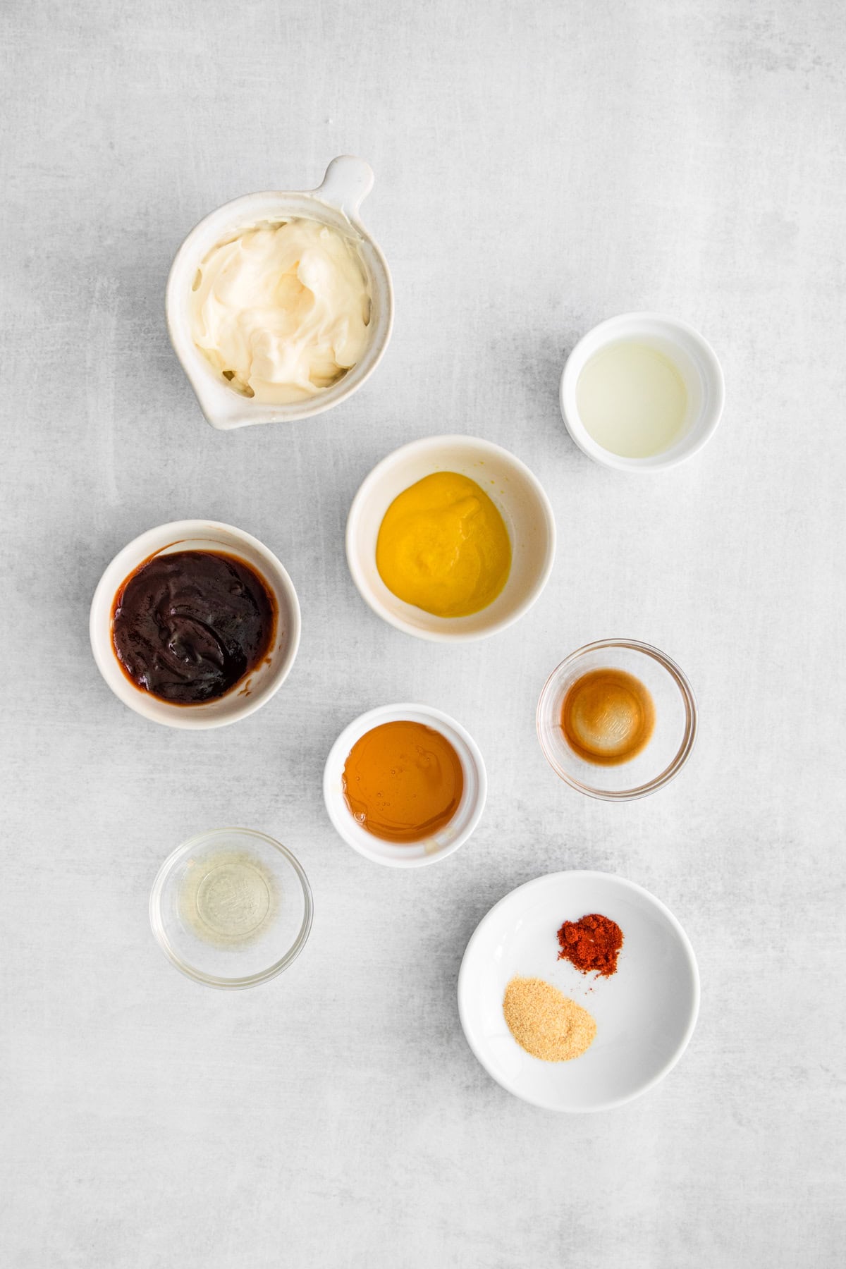 Ingredients to make Copycat Chick-fil-A Sauce on a table. 