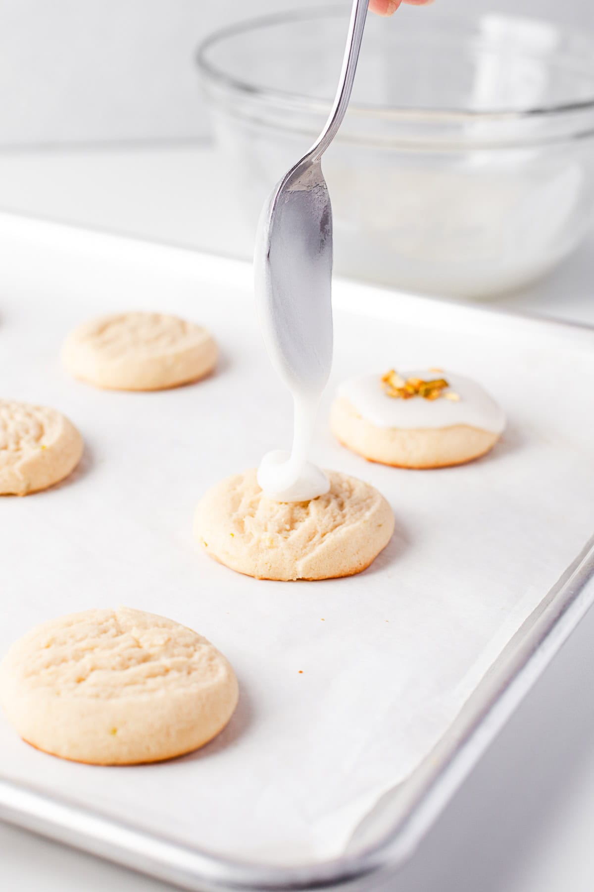 Glazing a cookie. 