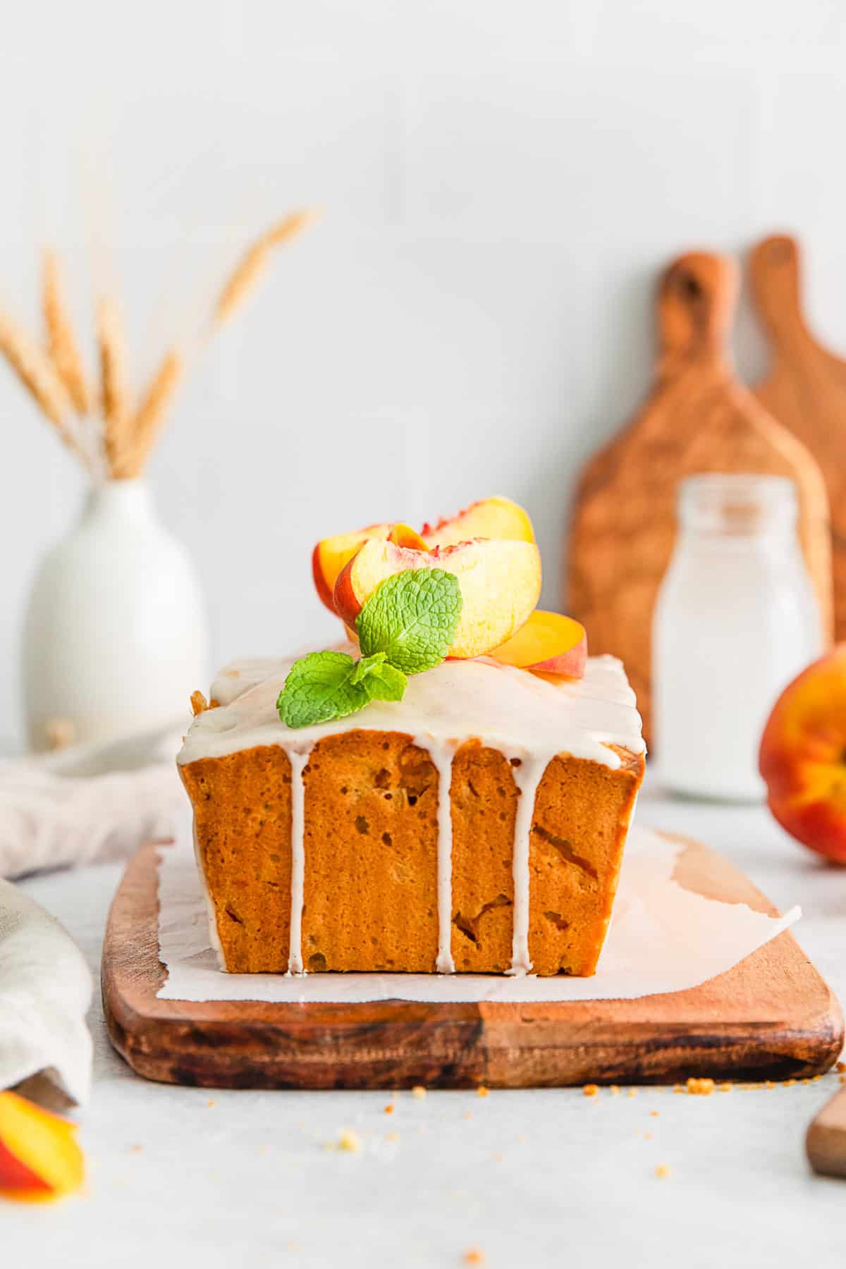 Peach Pound Cake topped with glaze. 