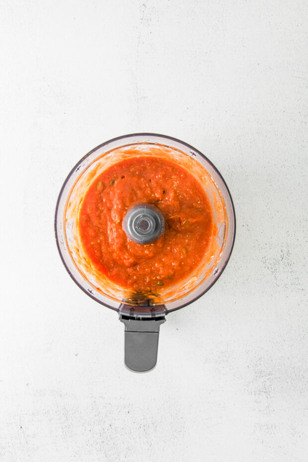 Pureed tomato sauce in a food processor. 