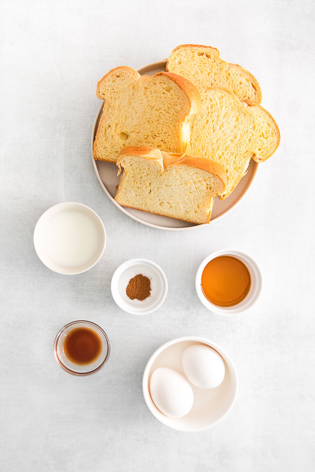 Air Fryer French Toast Sticks ingredients on a table.