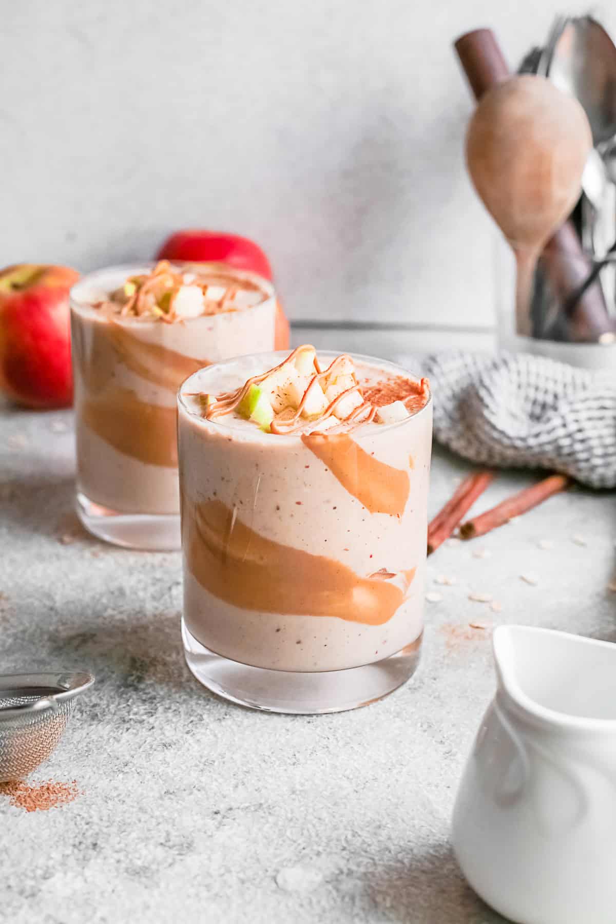 Apple pie smoothie with cinnamon on top.