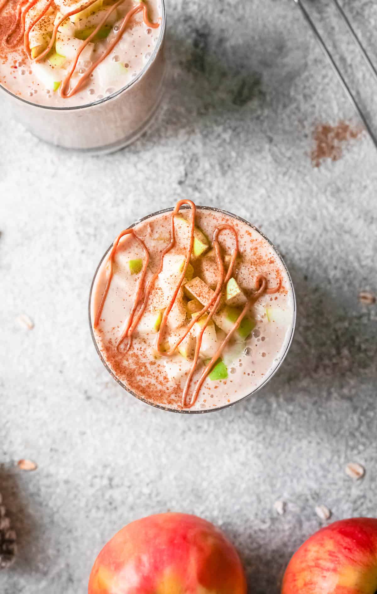 Apple pie smoothie drizzled with peanut butter.